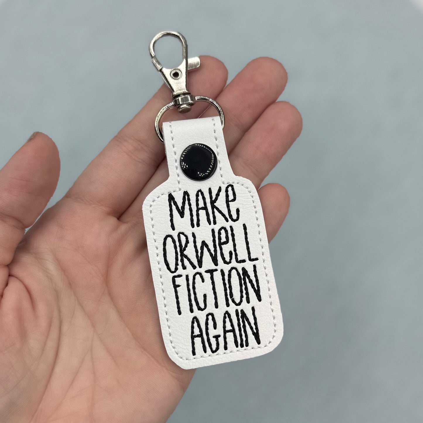 Make Orwell Fiction Again keychain