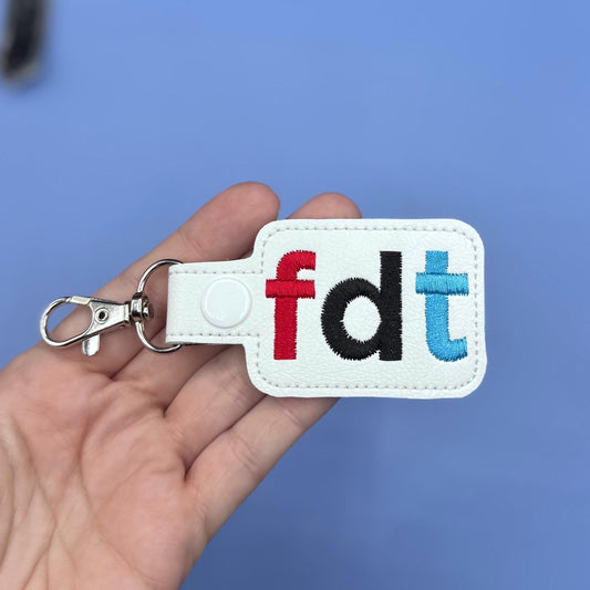 FDT lower case keychain public broadcast inspired npr-Charming Little Stitches