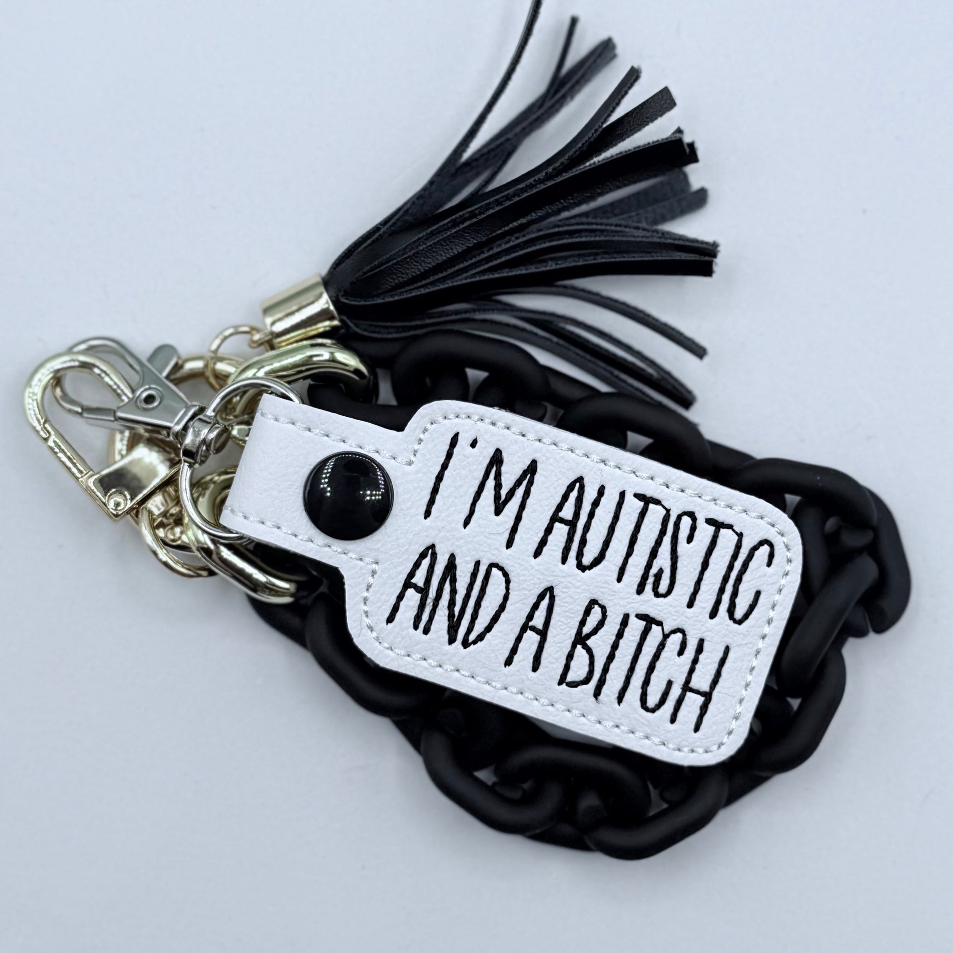 I’m Autistic and a Bitch keychain-Charming Little Stitches